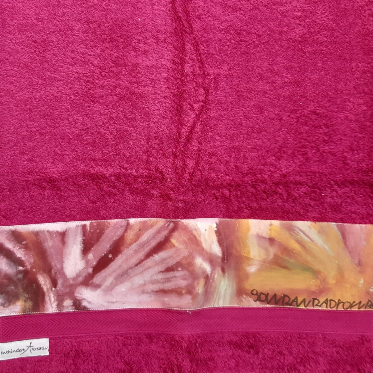 magenta Handtuch mit Sonnen